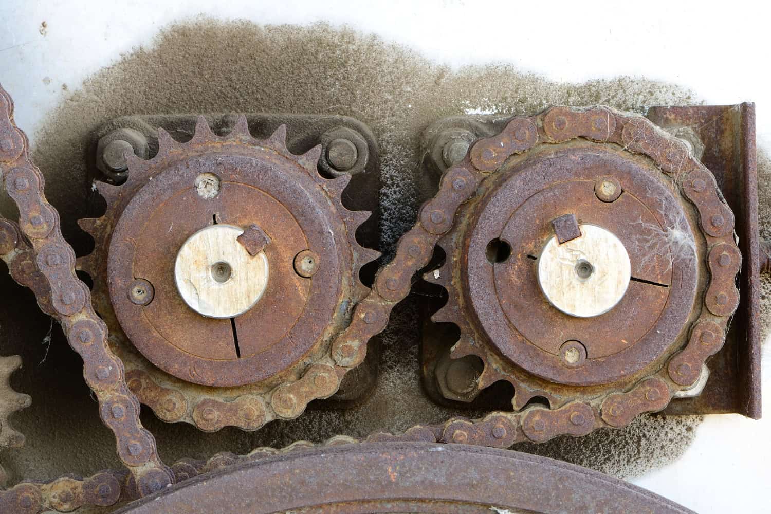 A rusty chain being used in a power transmission system